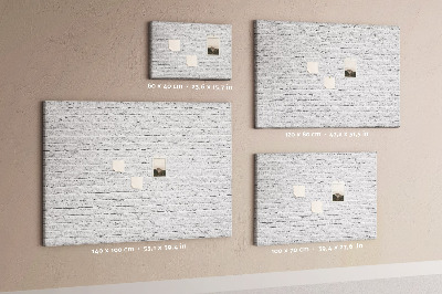 Nagy parafatábla Fehér téglafal színes rajzszegekkel